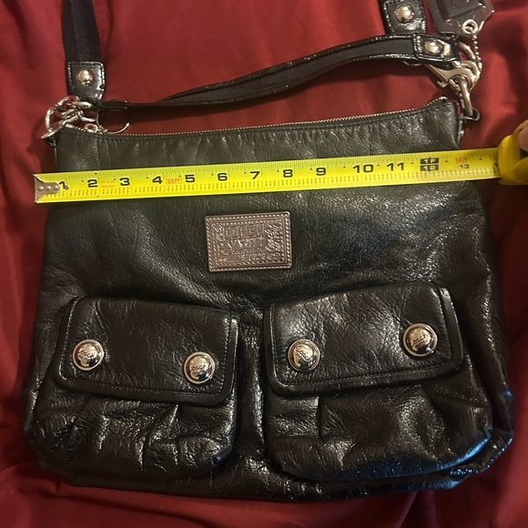 Coachpoppy Black Leather Crossbody Bag with Silver Accents